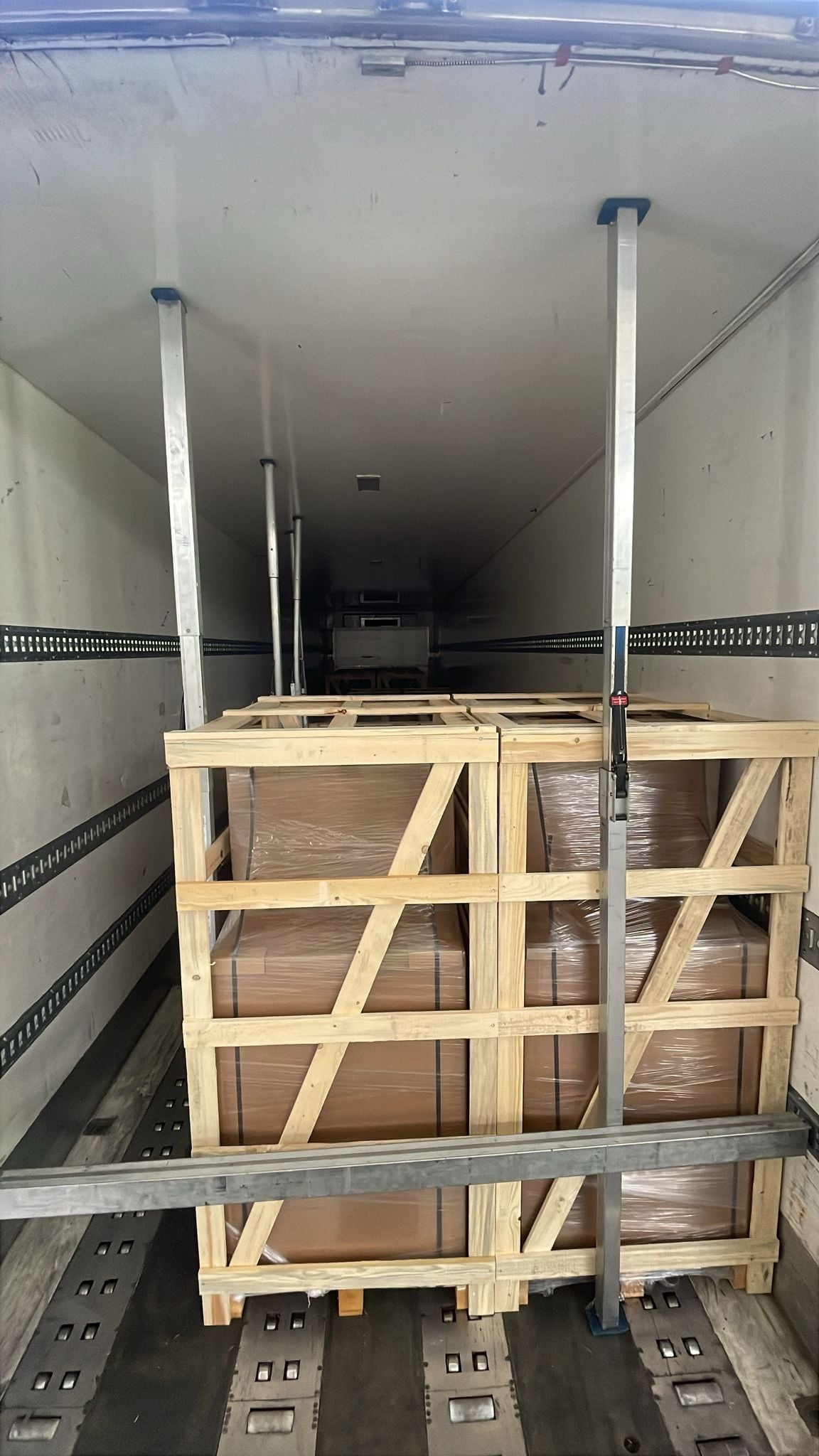 Timber-framed cargo secured inside a truck